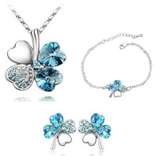 Load image into Gallery viewer, High fashion crystal clover three-piece suit Sautoir bracelet earrings Women fashion accessories wholesale 090 + 141 + 183